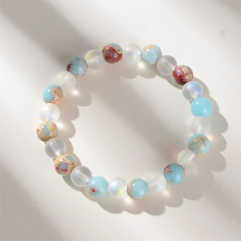 1 Quartz aura and ocean sediment bead bracelet - Unisex - Homog crystal jewelry - Brings abundance
