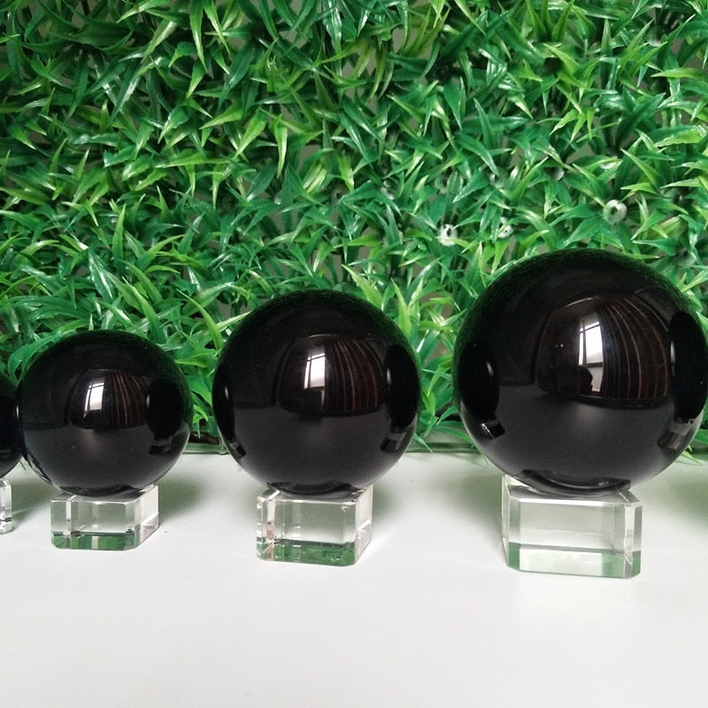 Natural obsidian crystal ball